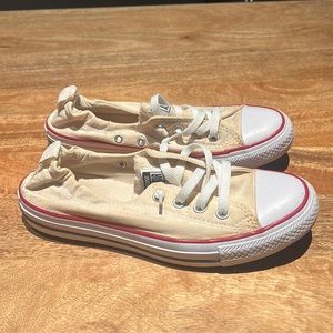 Converse. Very off white/yellowish. Great condition and washed! Size 8